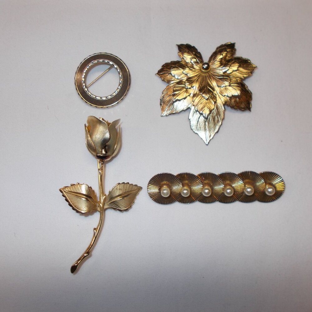 Bundle of four lapel pin/brooches, gold-tone color, rose, leaf, bar and circle